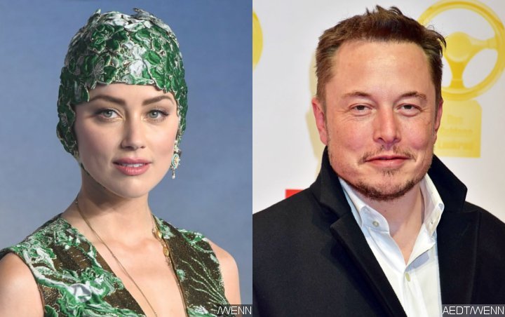 Amber Heard Maintains Beautiful Friendship With Elon Musk 