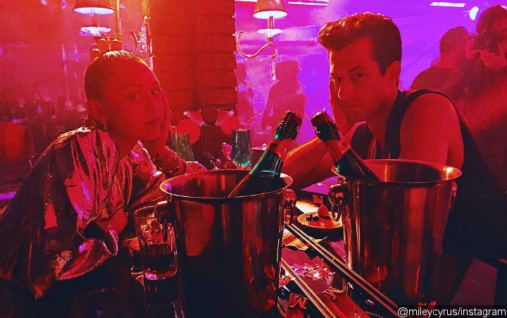 Miley Cyrus Confesses to Stealing Mark Ronson's Shirt From Music Video Shoot