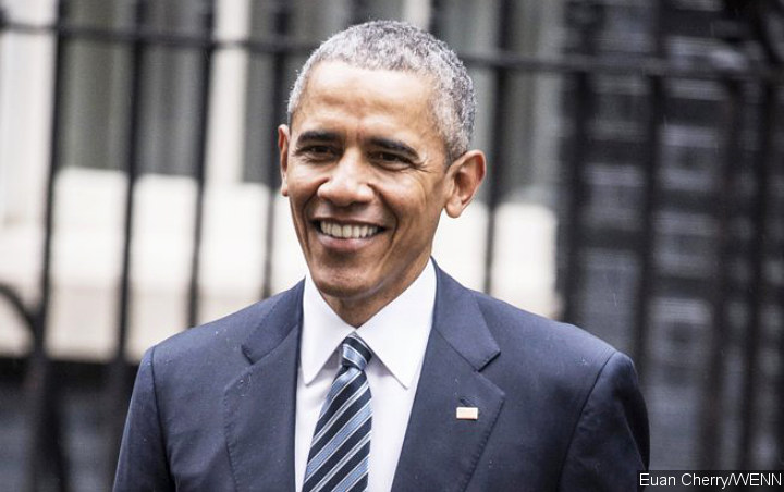 Barack Obama Plays Santa Claus on Surprise Visit to Children's Hospital