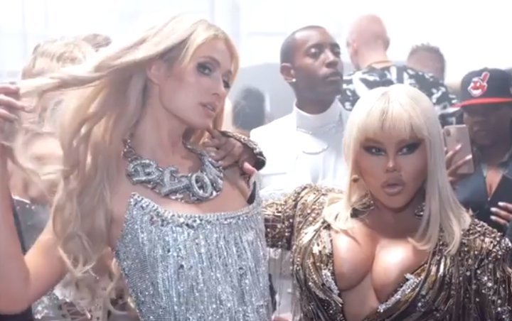 Paris Hilton and Lil' Kim at Juicy's NYFW Party – DuJour