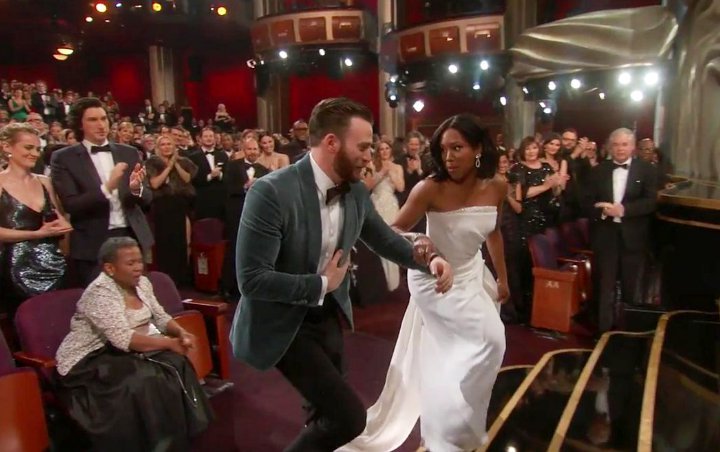 Oscars 2019: People Swoon at Chris Evans After He Escorts Regina King to the Stage