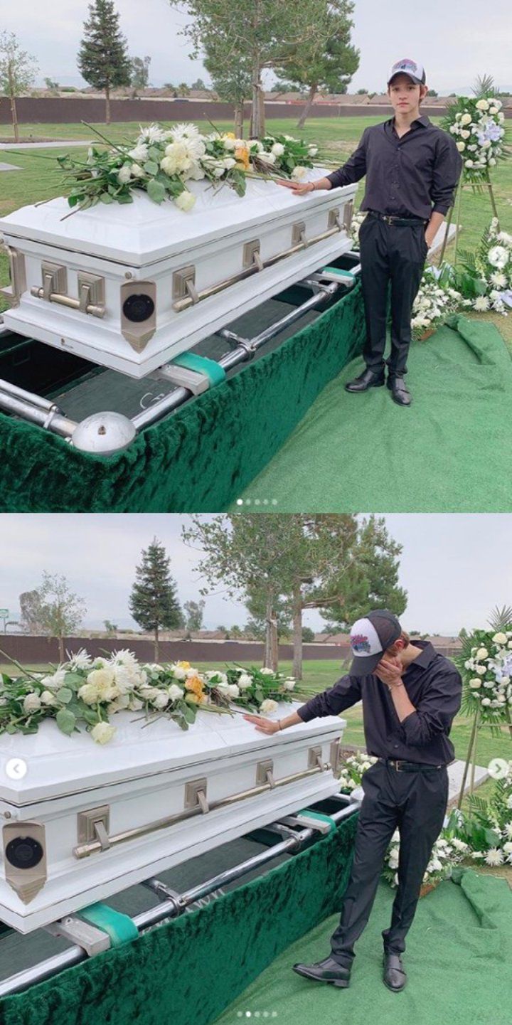 Samuel Poses in Front of His Father Jose Arredondo's Casket