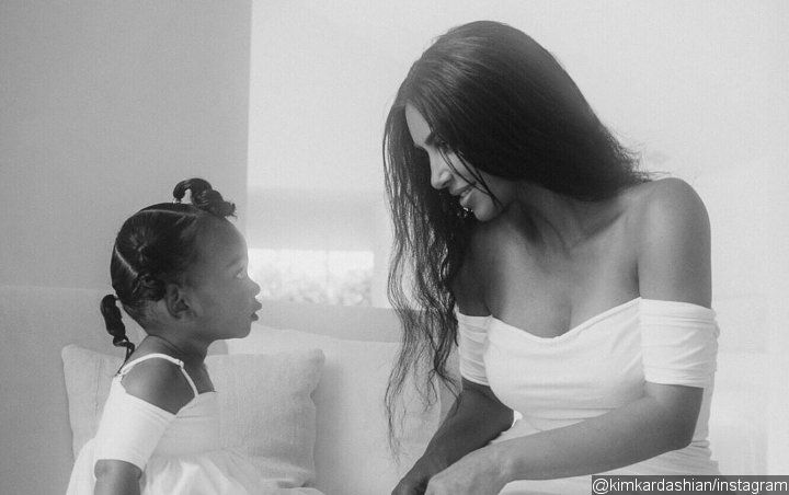 Kim Kardashian Is in Hot Water for Letting Daughter Chicago Play With Snake in New Video