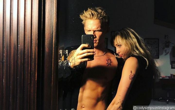 Miley Cyrus Puts Her Hand Down Cody Simpson's Pants, Gets New Tattoo With Him