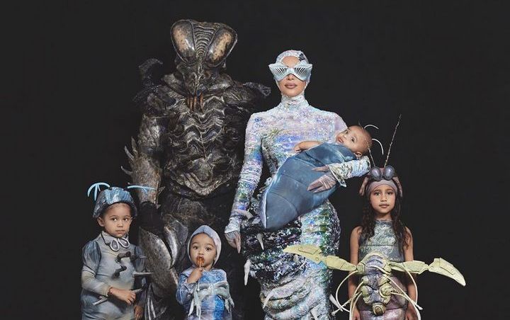 Kim Kardashian Wears Bra-Like Goggles as Worm in New Halloween Costume With Her Family