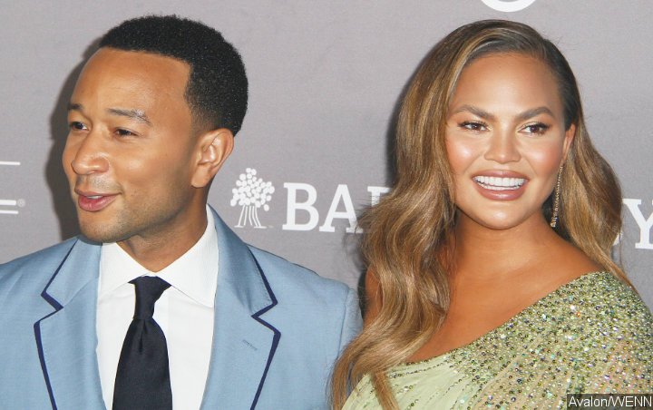 Watch: Chrissy Teigen Unimpressed as John Legend Shows Off His Abs