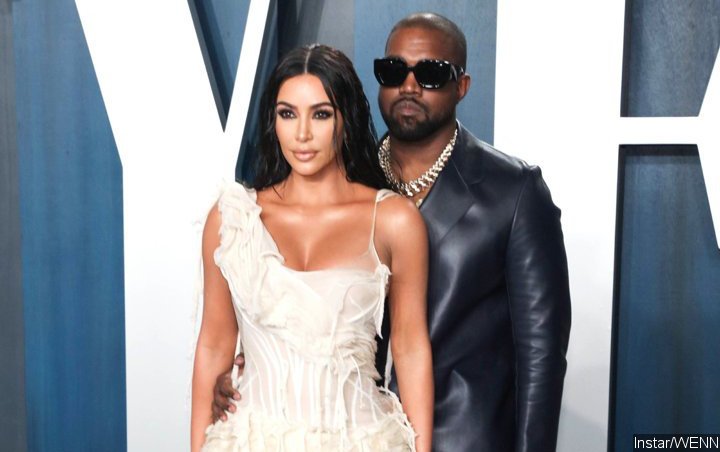 Kim Kardashian Attempts to Kiss Kanye West at NBA All-Star Game, He ...