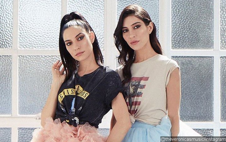 The Veronicas Practice Social Distancing by Planting Their Own Vegetables