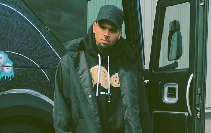 Watch: Chris Brown Gets Into Heated Argument With Fan Trying to Sneak Into His Home