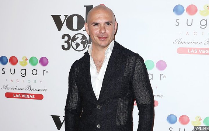 Pitbull Shares Snippet of Uplifting New Song About Beating Coronavirus Pandemic