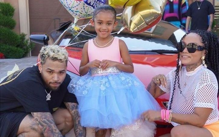 Chris Brown's Baby Mama Gets Cozy With Married NFL Player