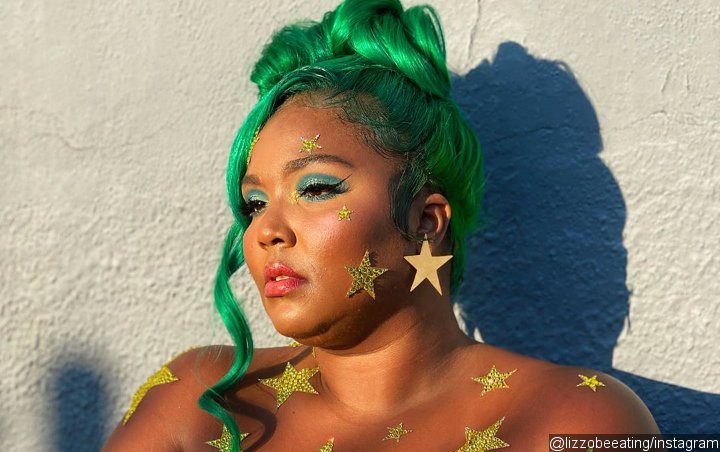 Lizzo Covered With Gold Stars in Topless Instagram Picture