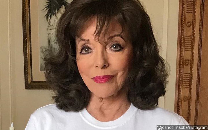 Joan Collins Gets 'Yelled at' by French Police for Using Plastic Visor Instead of Face Mask