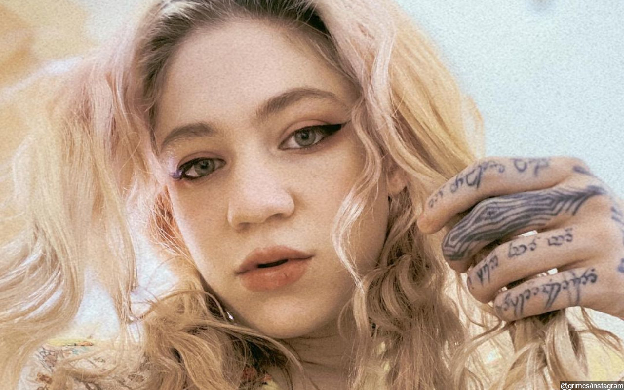 Grimes Offers A Look at 'Viking'-Inspired Haircut She Gave Her Baby Boy