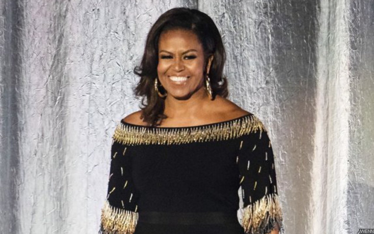 Michelle Obama Flaunts Natural Hair as She Receives COVID-19 Vaccine