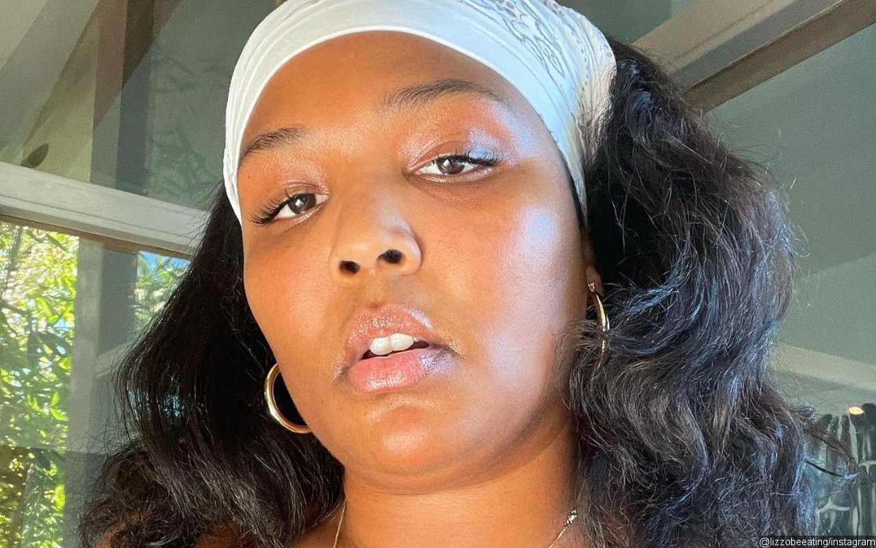 Lizzo Sets Record Straight on Relationship Status After Being Spotted Cuddling Up To Mystery Man