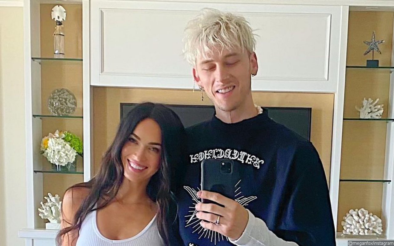 Megan Fox Packs on the PDA With Machine Gun Kelly During Surprise Appearance at Indy 500 Party