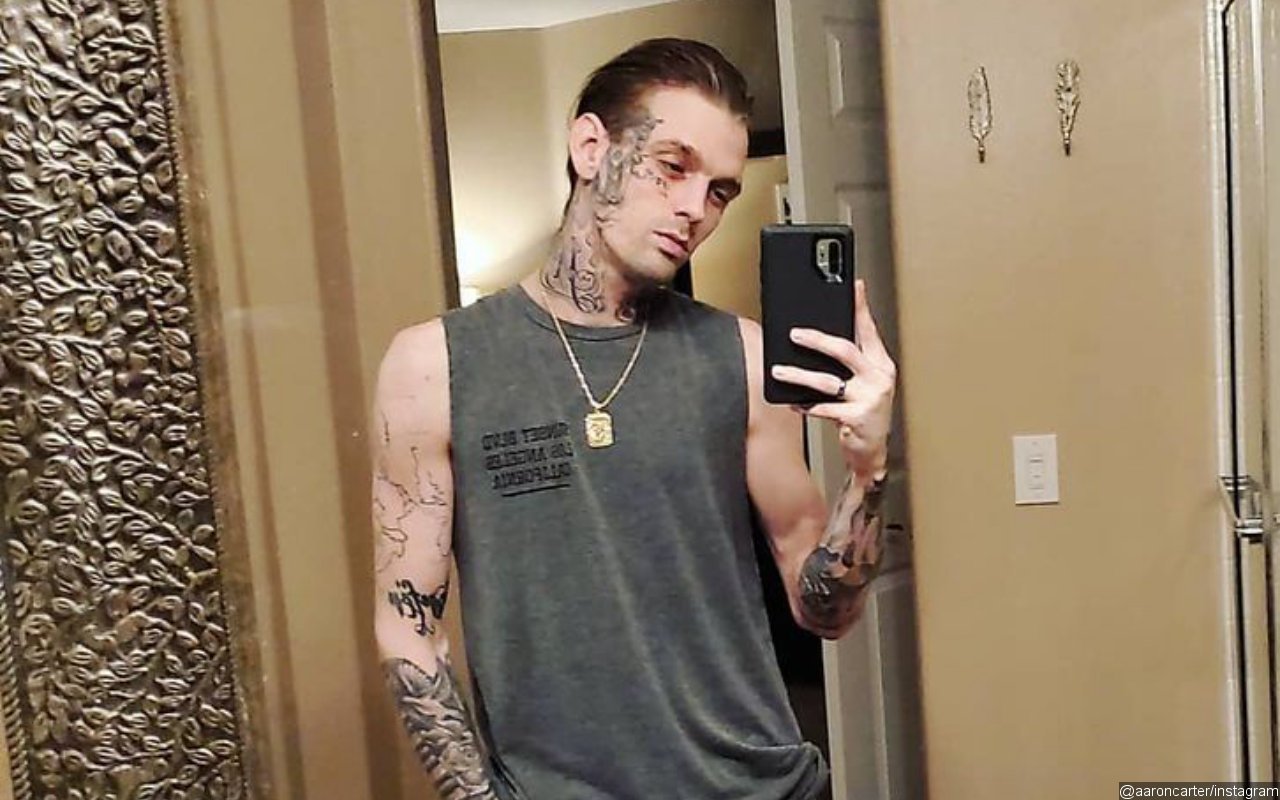 Aaron Carter calls face tattoo of pregnant exgirlfriends name a mistake  and questions paternity  Daily Mail Online