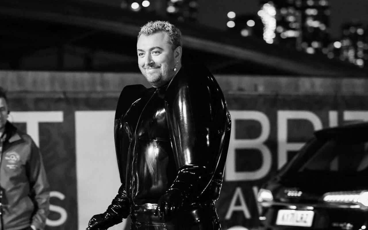 Sam Smith Gets Kooky in Balloon-Style Latex Outfit on Red Carpet at BRITs 2023