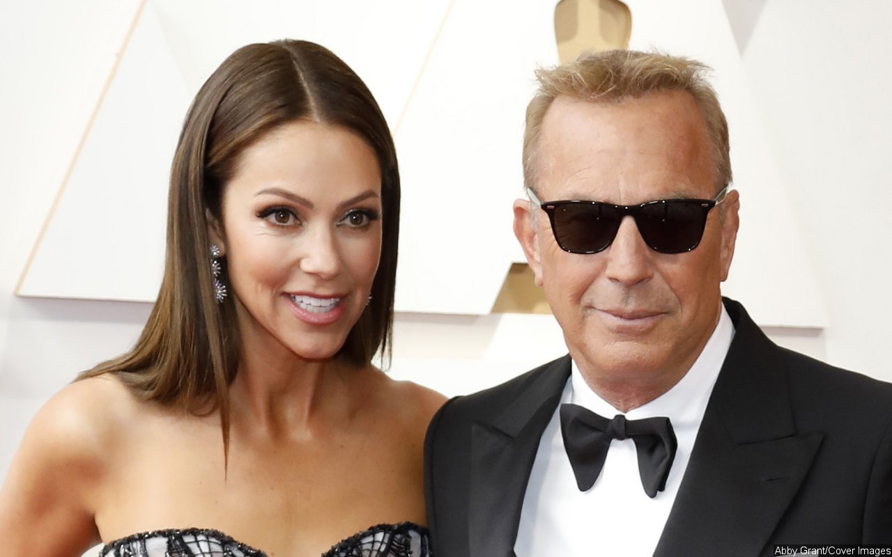 Kevin Costner and Christine Baumgartner