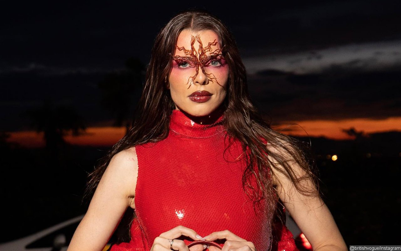 Julia Fox Arrives in Devilish Look Featuring Butt Cutout at British Vogue Bash