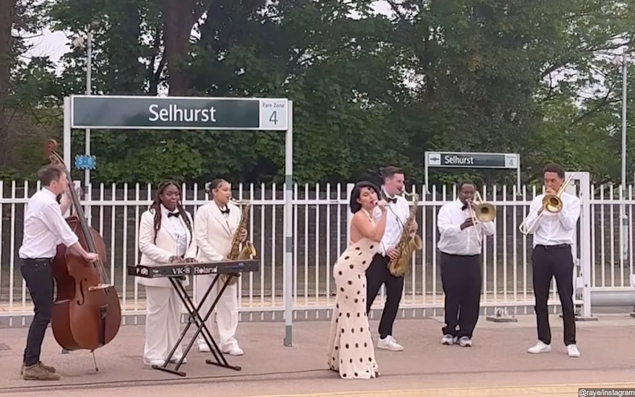 RAYE Offers Spectacular Performance of 'Genesis' on Train Station Platform