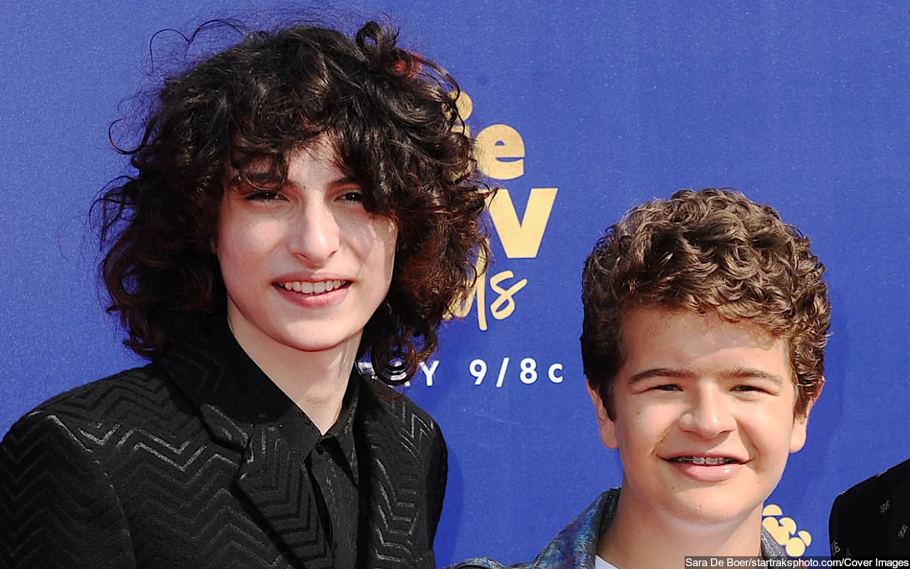 Finn Wolfhard and Gaten Matarazzo Hold Hands on a Stroll With Gaten's