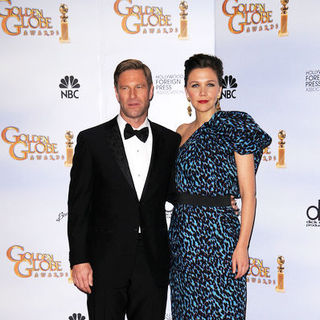 Aaron Eckhart, Maggie Gyllenhaal in 66th Annual Golden Globes - Press Room