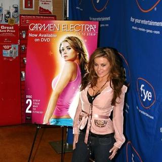 Carmen Electra in Carmen Electra Signs Her New DVD Fit To Strip