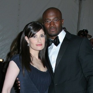 Taye Diggs, Idina Menzel in Poiret, King of Fashion - Costume Institute Gala at The Metropolitan Museum of Art - Arrivals