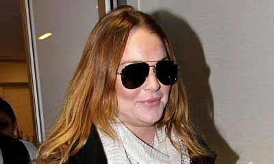 Lindsay Lohan Suffering From Incurable Virus During Holiday Vacation