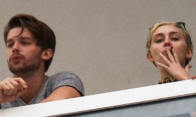 Miley Cyrus and Patrick Schwarzenegger Hit the Pool, Smoke Together