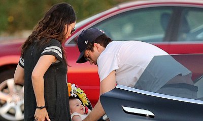 Ashton Kutcher and Mila Kunis Take Baby Wyatt Out for a Walk on Beach