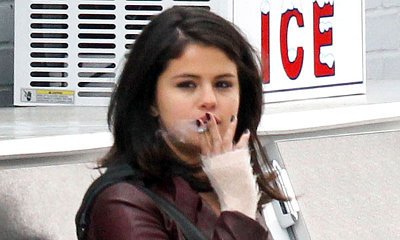 Selena Gomez Smokes in 'Revised Fundamentals of Caregiving' On-Set Picture