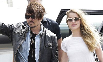 Johnny Depp and Amber Heard Arrive in Australia Hand-in-Hand Amid Marital Problem Rumors