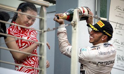 Lewis Hamilton Criticized for Spraying Hostess in the Face With Champagne at Chinese Grand Prix