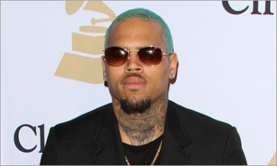 Chris Brown Calls Cop After Finding Naked Woman in His Bed