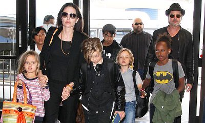 Angelina Jolie, Brad Pitt and Their Six Children Fly in Economy Class
