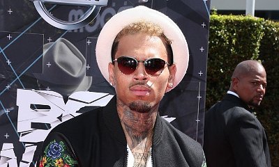 Chris Brown Plans to Sue the Woman He Denied Punching