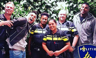 Chris Brown Poses With Amsterdam Police After Being Fined for Riding Dirt Bike Without License Plate