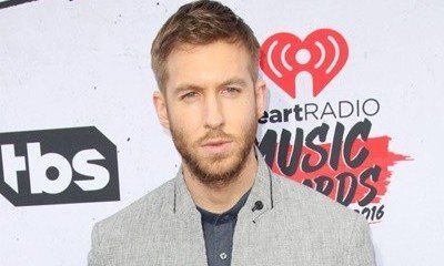Taylor Swift Who? Calvin Harris Gets Flirty With Mystery Brunette While Partying in Cabo