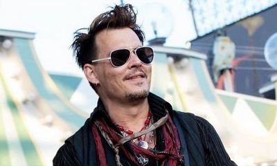Johnny Depp Has Amber Heard Nickname Tattoo Altered Into 'SCUM' Amid Bitter Divorce