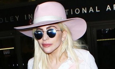 Lady GaGa Has New Boyfriend, They Pack on PDA at Super Bowl