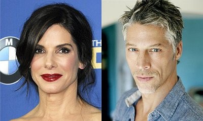 Sandra Bullock and Bryan Randall Spotted on Rare Outing During Family Vacation