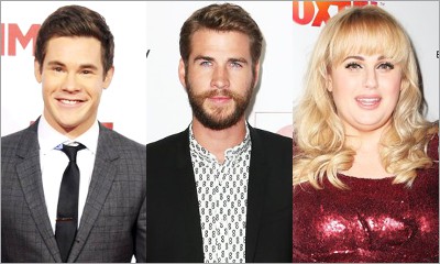 Adam DeVine, Liam Hemsworth to Join Rebel Wilson in 'Isn't It Romantic'