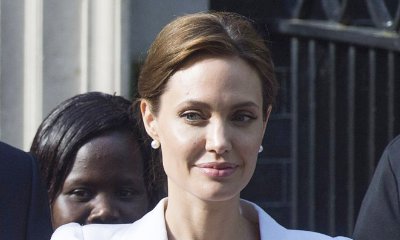 Angelina Jolie Spotted With Mystery Man While Celebrating Kids' Birthday at Disneyland