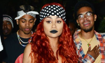 Blac Chyna Goes Redhead and Flaunts Major Sideboob in Plunging Jumpsuit in Hollywood