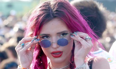 Bella Thorne Flaunts Boobs and Abs in Skimpy Red Bikini During Outing in L.A.