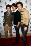 Video: Jonas Brothers Make Coats and 10,000 Dollars Check Donations on 'GMA'
