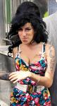 Amy Winehouse Said to Adopt a St. Lucian Child